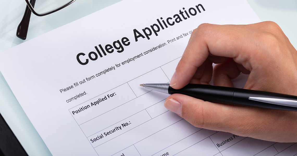 Person filling college application form